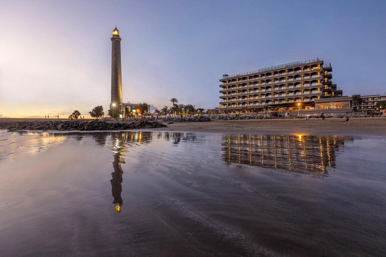 Hotel Faro, A Lopesan Collection Hotel - Adults Only Maspalomas  Exterior foto The lighthouse and the hotel at night