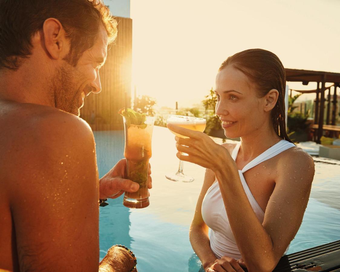 Hotel Faro, A Lopesan Collection Hotel - Adults Only Maspalomas  Exterior foto A couple drinking cocktails