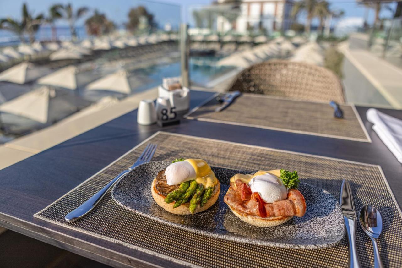 Hotel Faro, A Lopesan Collection Hotel - Adults Only Maspalomas  Exterior foto Poached eggs on a muffin
